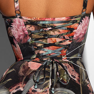 Back view of Seamed Lushy Midi Dress showing signature corset lacing that snatches the waist for a custom sculpted fit.