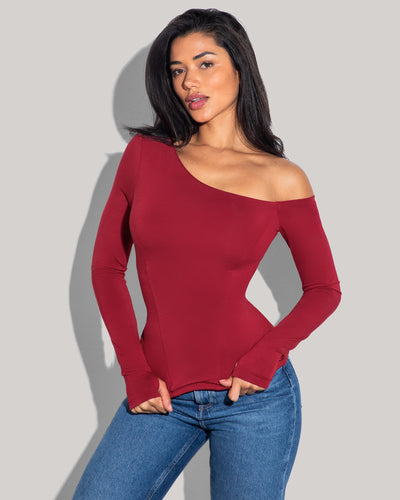 Model is posing in Shapey Long Sleeve One Shoulder Sculpting Shapewear Top - Ruby front view