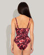 Model wears Lushy Underwire Sculpting Shapewear Swimsuit - Cranberry Floral back view