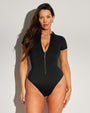 Model wears Short Sleeve Surfy One Piece Sculpting Shapewear Swimsuit - Black
