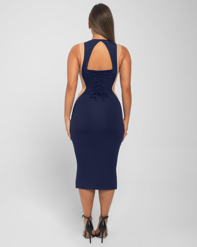 Model wears Illusion Column Midi Shapewear Dress - Contour Midnight/Sand back view