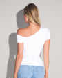 Model wears Shapey Short Sleeve One Shoulder Shapewear Top - White back view