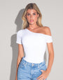Model wears tucked in Shapey Short Sleeve One Shoulder Shapewear Top - White front view 