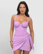 Model is in Mini Wrap Skirty Built-in Shapewear Swim Cover-Up - Wild Violet