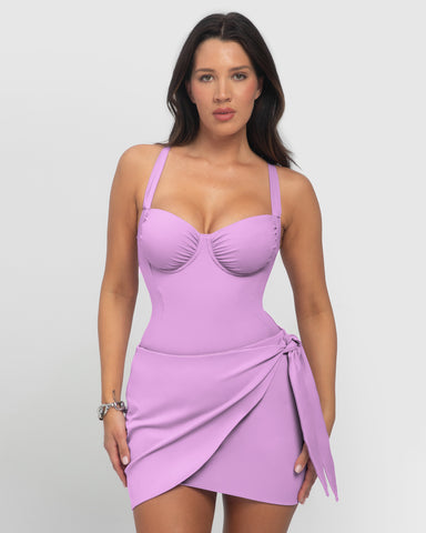 Model is in Mini Wrap Skirty Built-in Shapewear Swim Cover-Up - Wild Violet