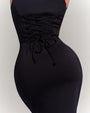 Model wears Sleeveless Surfy Pencil Midi Shapewear Dress - Black back view close up