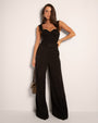Model wears Bombshell Sleeveless Sculpting Shapewear Top - Black and pants full front view