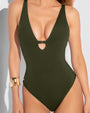 Model is wearing Brazilian Plungey Keyhole Shapewear Swimsuit - Fern Green close up front