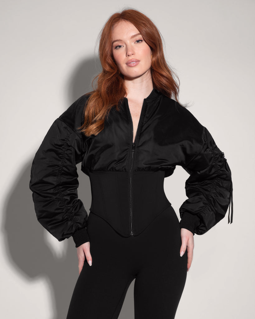 Model is in Corsety Bomber Zipper Front Waist Shaping Jacket - Black