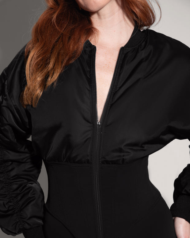 Model is in Corsety Bomber Zipper Front Waist Shaping Jacket - Black front close up