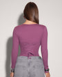 Model is posing in Corsety Square Neck Long Sleeve Sculpting Shapewear Top - Grape back view
