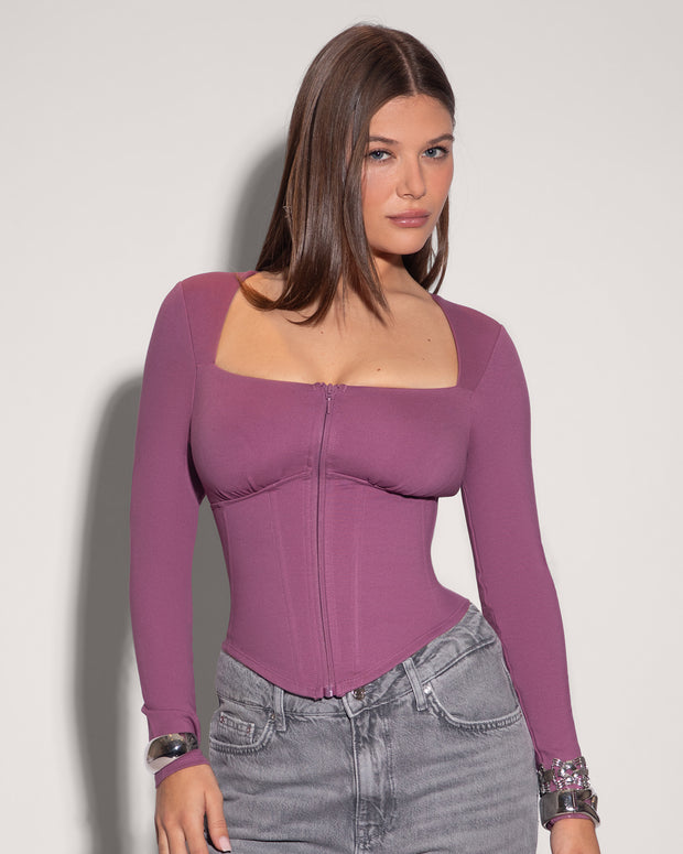 Model is posing in Corsety Square Neck Long Sleeve Sculpting Shapewear Top - Grape