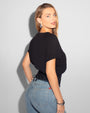 Model wears Corset Blousey Raglan Sleeve Shapewear Tee - Black side view