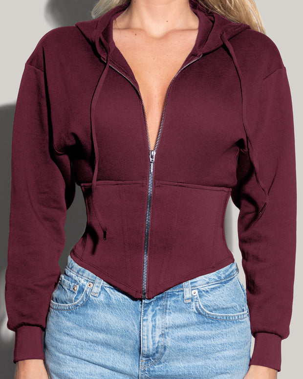 Model is wearing Corsety Long Sleeve Shapewear Hoodie - Dark Cherry close up front