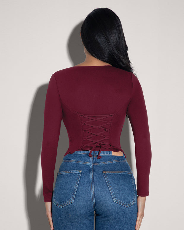 Model wears Corsety Square Neck Long Sleeve Shapewear Top - Dark Cherry back view