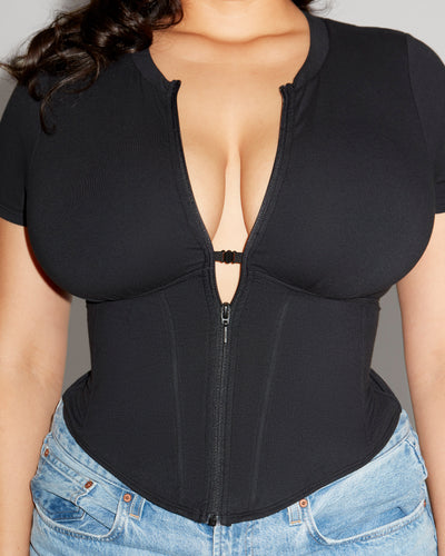 Model wears Short Sleeve Corsety Sculpting Shapewear Top - Black front close up