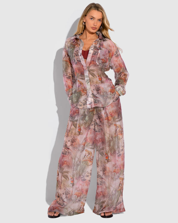 Model is posing in Flowy Oversized Collared Button Front Shirt - Cheeky Monkey and matching pants front view