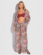 Model is posing in Flowy Oversized Collared Button Front Shirt - Cheeky Monkey and matching pants front view