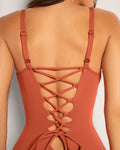 Model wears Hi Cut Plungey Triangle One Piece Tummy Control Shapewear Swimsuit - Baked Clay back view close up