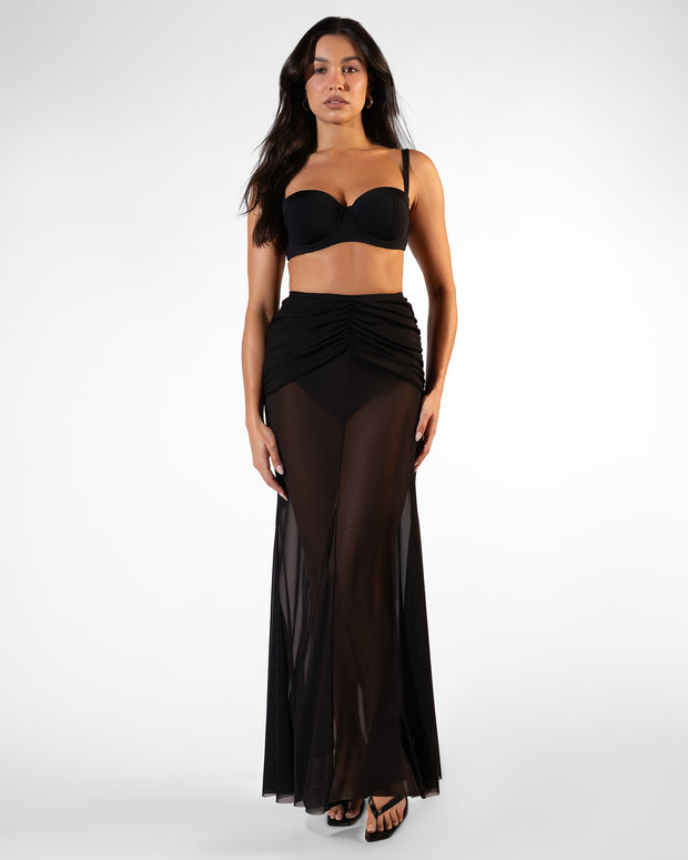 Full body front view of Mermaid Sheer Skirty - Black paired with Bombshell Bikini Top - Black on model