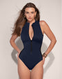 Model wears Sleeveless Surfy - Contour Midnight/Black half zipped front view