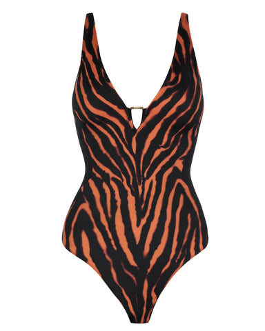 Model wears Plungey Triangle - Baked Clay Zebra/Black Shapewear Swimsuit side view