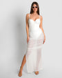 Model wears Ruched Sheer Side Slit Maxi Skirty - White and matching color one piece swimsuit