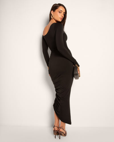 Model posing in Goddess Shaping Shapewear Midi Skirt - Black side view