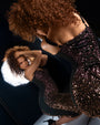 Model in Seamed Lushy Midi Dress - Sequin Ombre Bronze/Plum looking in the mirror 