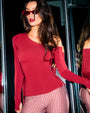 Model is posing in Shapey Long Sleeve One Shoulder Sculpting Shapewear Top - Ruby side view