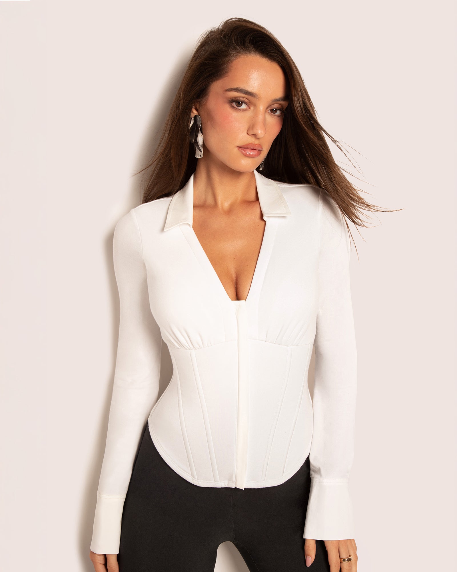 Model wears Shirty Long Sleeve Shapewear Top - White front view