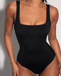 Model wears Squarey - Black One Piece Sculpting Tummy Control Shapewear Swimsuit close up front view