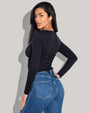 Model is posing in Corsety Square Neck Long Sleeve Sculpting Shapewear Top - Black side view