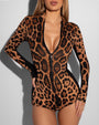Model wears Surfy Boy Shortie Shapewear Swimsuit - Symmetric Leopard / Black Front View unzipped
