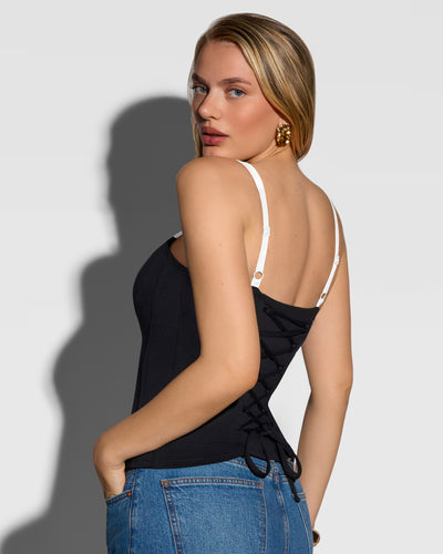 Three quarter back view of model wearing Shapey Cami Bra - Black/Lace White