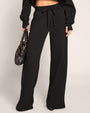 Front close up of model in Fleecey Wide Leg Pull On Pant - Black