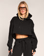 Model wearing Convertible Fleecey - Black cropped at the shortest length