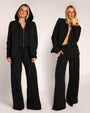 Graphic of Swuity Convertible Jacket - Black showing a side by side of the zip front hoodie and blazer