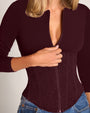 Close up of model in Corsety Long Sleeve Top - Lace Garnet/Garnet