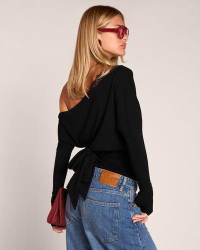 Back view of model wearing Sashy Wedge Long Sleeve Top - Black/Lace Black