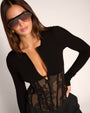 Front view of model wearing Corsety Long Sleeve Top - Lace Black/Tawny