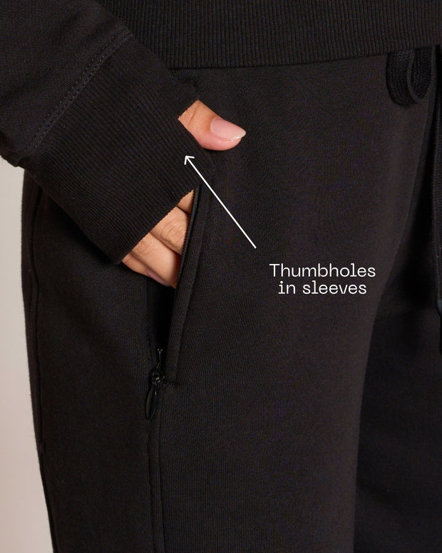 Graphic of Croissant Fleecey - Black highlighting thumbholes in sleeves
