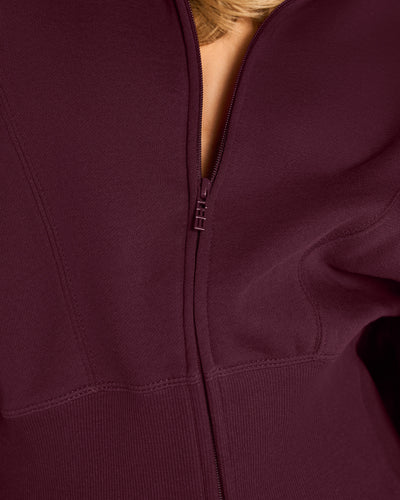 Close up of zipper on Croissant Fleecey - Garnet