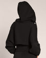 Back view of Croissant Fleecey - Black on model