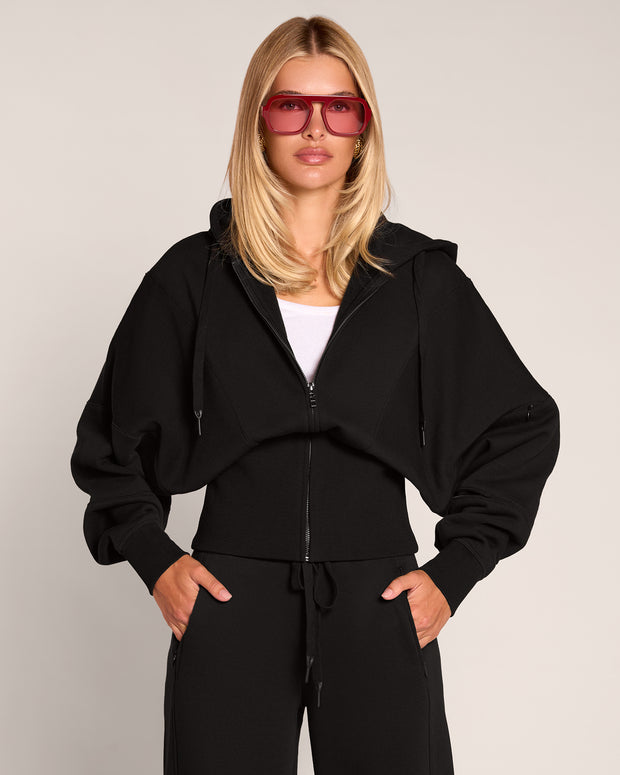 Model wearing Croissant Fleecey - Black front view