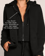 Graphic of Swuity Convertible Jacket - Black highlighting the removable zip front hoodie