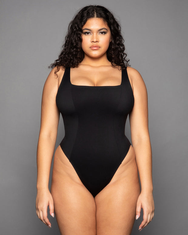 Model is wearing Hi Cut Squarey One Piece Sculpting Shapewear Swimsuit - Black full front view